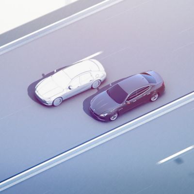 Traffic Sign Recognition - Maserati driving parallel to another car in a freeway